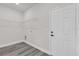 Functional laundry room with shelving and modern gray flooring at 17501 Sw 41St Cir, Ocala, FL 34473
