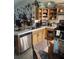 Functional kitchen with stainless steel appliances and ample counter space, ready for cooking at 1907 Myakka Ct, Poinciana, FL 34759