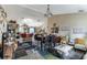 Open-concept living space with eclectic decor, connecting living and dining areas at 1907 Myakka Ct, Poinciana, FL 34759