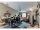 Inviting living room with dining area featuring stylish decor and comfortable furnishings at 1907 Myakka Ct, Poinciana, FL 34759