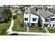 Stylish two-story house with well-kept lawn and a modern architectural style at 2035 White Feather Loop, Oakland, FL 34787