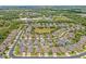 Stunning aerial perspective of a residential area, boasting lush landscaping and well-maintained properties at 2051 Sandy Garden Ln, Winter Garden, FL 34787