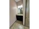 Comfortable bathroom with dark cabinets at 2051 Sandy Garden Ln, Winter Garden, FL 34787
