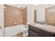 Modern bathroom featuring updated fixtures, ample counter space, and warm accents at 2051 Sandy Garden Ln, Winter Garden, FL 34787