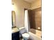 Clean bathroom featuring a tub and shower combination with a white curtain and a granite vanity at 2051 Sandy Garden Ln, Winter Garden, FL 34787