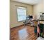 Bedroom with new laminate flooring and natural light at 2051 Sandy Garden Ln, Winter Garden, FL 34787