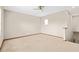 Spacious loft area with plush carpeting, suitable for recreation or relaxation at 2051 Sandy Garden Ln, Winter Garden, FL 34787