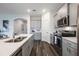 Well-equipped kitchen featuring stainless steel appliances, and lots of counter space at 2068 Ashwood Bluff Dr, Ocoee, FL 34761