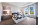 Beautiful bedroom with large windows, and a luxurious bed at 2068 Ashwood Bluff Dr, Ocoee, FL 34761