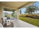 Cozy patio area with seating, perfect for outdoor relaxation and enjoying the view at 2068 Ashwood Bluff Dr, Ocoee, FL 34761
