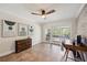 Bright office space with ceiling fan, decor and sliding glass doors to an outdoor deck at 211 Crown Oaks Way # 205, Longwood, FL 32779