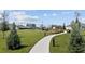 A lovely playground area with a walking path provides a safe and fun area for children to play at 2113 Lasso Loop, Eagle Lake, FL 33839