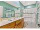 Stylish bathroom with a shower/tub combo, complete with creative decor at 213 N Monterey Isle, Longwood, FL 32779