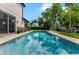 Private pool with patio is perfect for relaxation and entertaining featuring manicured backyard and landscaping at 213 N Monterey Isle, Longwood, FL 32779