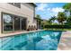 Sparkling pool and patio area offer a seamless blend of indoor/outdoor living with direct access to the home at 213 N Monterey Isle, Longwood, FL 32779