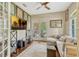 Sitting Room featuring hardwood floors, a comfortable couch, and sliding glass doors to an outdoor patio at 213 N Monterey Isle, Longwood, FL 32779