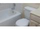 The bathroom showcases a standard white tub and toilet, providing a functional space at 2260 Willie Mays Pkwy, Orlando, FL 32811