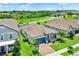 Aerial view of a well-maintained home with lush green surroundings in a desirable neighborhood at 2390 Standing Rock Cir, Oakland, FL 34787