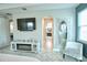 Hallway view from the Primary bedroom showing the ensuite bathroom and stylish decor at 2390 Standing Rock Cir, Oakland, FL 34787