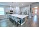 Bright kitchen features a large island, stainless appliances, and a modern design at 2390 Standing Rock Cir, Oakland, FL 34787