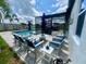 Beautiful pool area with screened enclosure and outdoor seating for relaxing and entertaining at 2390 Standing Rock Cir, Oakland, FL 34787