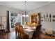 Elegant dining room with a large table, perfect for Gathering gatherings and dinner parties at 2418 Ridgemooor Dr, Orlando, FL 32828
