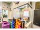 A fun area with various toys and colorful design elements at 2418 Ridgemooor Dr, Orlando, FL 32828