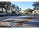 A well-maintained community tennis court offering residents opportunities for outdoor recreation and exercise at 2501 Grassy Point Dr # 107, Lake Mary, FL 32746