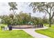 Community playground featuring swings, a slide, and a safe, fenced-in play area at 3028 Water Sprite St, Orlando, FL 32808