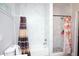 Marble-look bathroom with separate tub and shower areas, adding elegance and convenience at 309 E 13Th St, Apopka, FL 32703