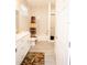 Bathroom with a double sink vanity, toilet and walk-in shower at 309 E 13Th St, Apopka, FL 32703
