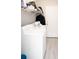 Laundry room features a white washer and dryer near the back door at 309 E 13Th St, Apopka, FL 32703