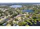 Aerial view of neighborhood, showcasing proximity to lake and cityscape at 3535 Lake Sarah Dr, Orlando, FL 32804
