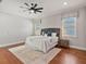 Tastefully decorated bedroom features plush carpeting, neutral tones, and ample natural light at 3535 Lake Sarah Dr, Orlando, FL 32804