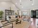 Open-concept living room offering seamless transition to the dining area and front entrance at 3535 Lake Sarah Dr, Orlando, FL 32804