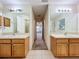 Bathroom featuring dual sinks, ample counter space, and a bright and functional design at 36730 Oconee Ave, Eustis, FL 32736