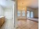 Bright interior featuring tile flooring, natural light, and views to other rooms at 36730 Oconee Ave, Eustis, FL 32736