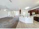 Open floor plan connects the living room and kitchen for modern living at 36730 Oconee Ave, Eustis, FL 32736