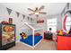 bedroom with car theme featuring creative decor, playful accents, and a charming bed frame at 3943 Crawley Down Loop, Sanford, FL 32773