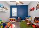 Bright playroom with various toys, storage solutions, and creative spaces for activities at 3943 Crawley Down Loop, Sanford, FL 32773