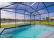 Screened pool with beautiful lake view, perfect for relaxing and entertaining in your private backyard oasis at 3943 Crawley Down Loop, Sanford, FL 32773