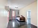 Spacious living room with sleek floors and cooling unit at 4160 Packard Avenue, St Cloud, FL 34772