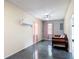 Open living room with pink curtains and sleek floors at 4160 Packard Avenue, St Cloud, FL 34772