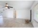 Bright living room with modern tile flooring and great light at 4160 Packard Avenue, St Cloud, FL 34772