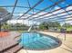 Beautiful screened pool with tropical landscaping and easy access at 4160 Packard Avenue, St Cloud, FL 34772