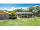An outdoor pool surrounded by a screened enclosure provides privacy and enjoyment at 4160 Packard Avenue, St Cloud, FL 34772