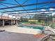 Enjoy this relaxing screened pool with a slide and waterfall features at 4160 Packard Avenue, St Cloud, FL 34772