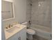 This bathroom features modern fixtures, a marble tiled shower, and ample storage at 4325 Sw 157Th Ter, Ocala, FL 34481