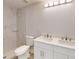 This bathroom features a double sink vanity and tiled shower at 4325 Sw 157Th Ter, Ocala, FL 34481
