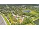 Neighborhood aerial showcasing lake access, mature trees and nearby highway access at 4865 Gorham Ave, Orlando, FL 32817